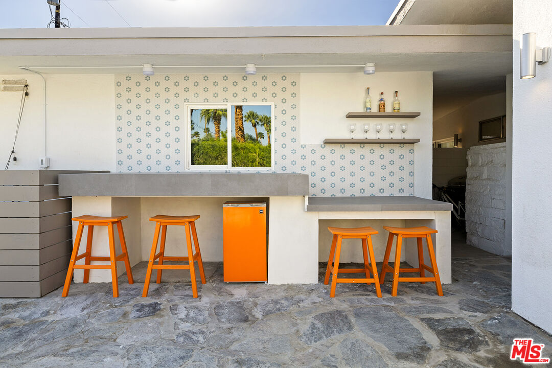 74085 Setting Sun Trail Palm Desert, CA 92260 - Photo 36 of 57 a view of an empty room with window and fireplace