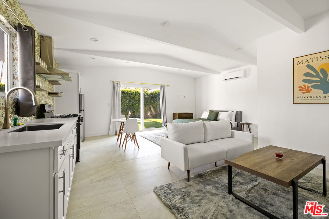 74085 Setting Sun Trail Palm Desert, CA 92260 - Photo 40 of 57 a living room with furniture and a table