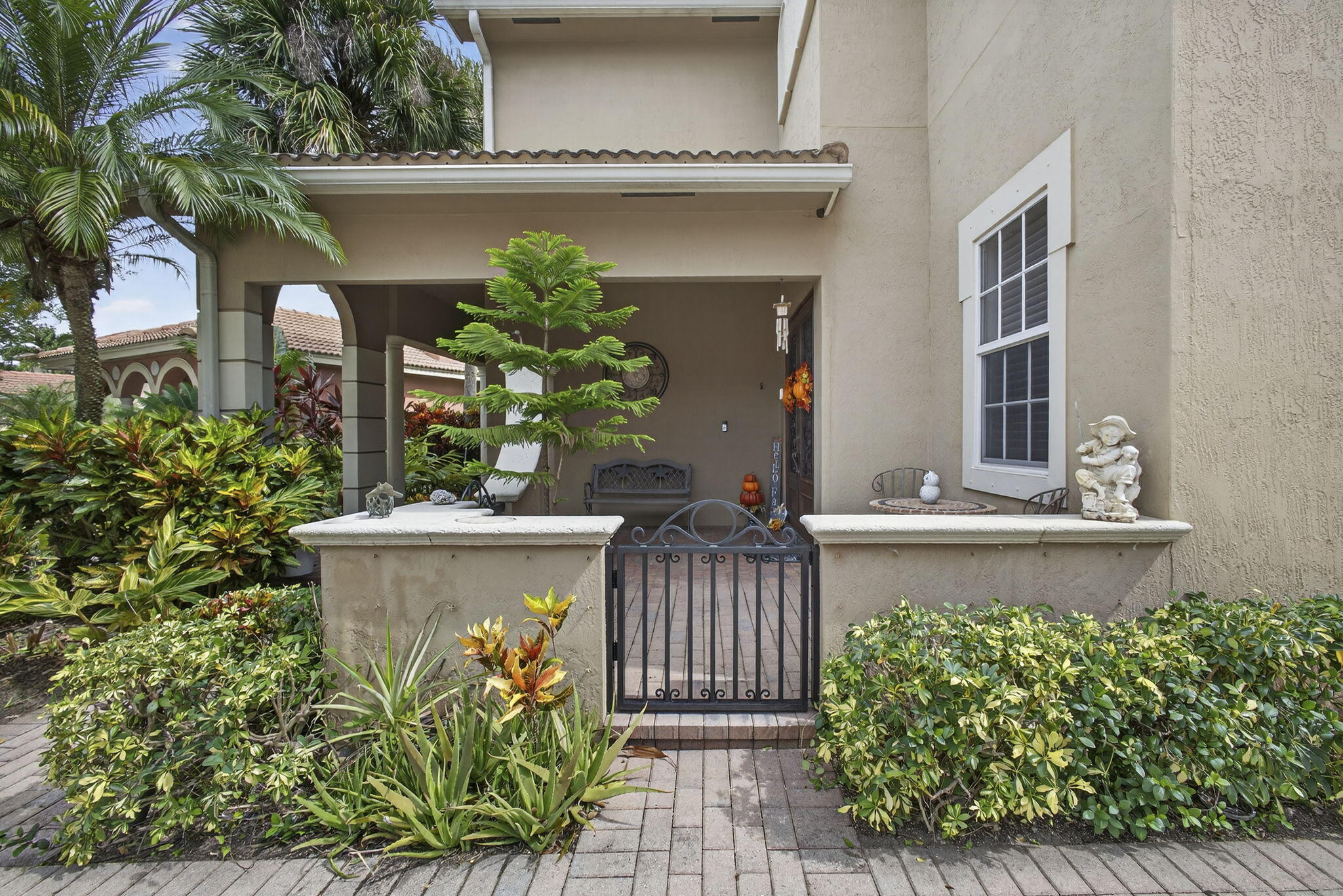 129 Via Bosque Jupiter, FL 33458 - Photo 14 of 92 front view of a house