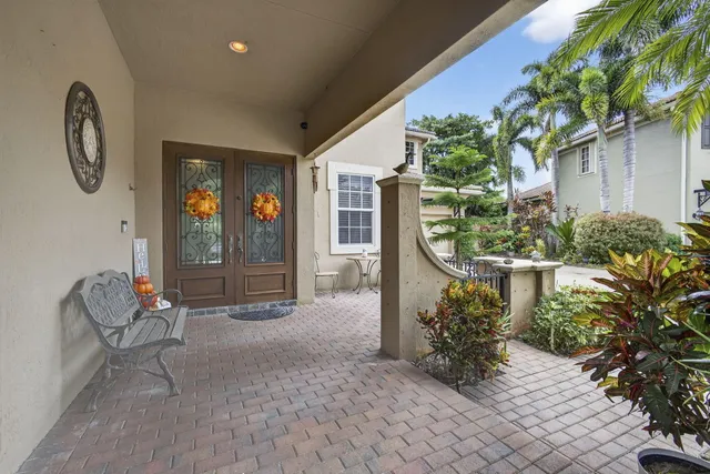 a kitchen with stainless steel appliances granite countertop a refrigerator and a stove