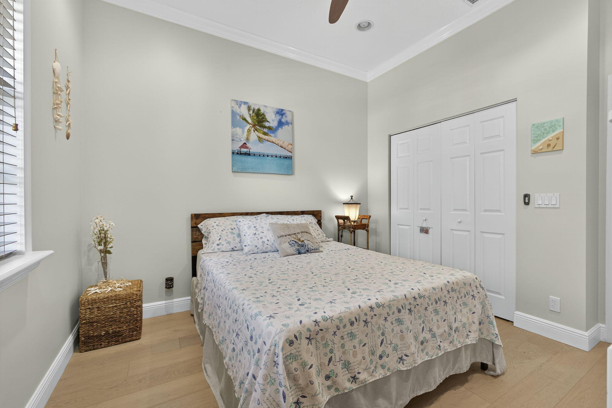 129 Via Bosque Jupiter, FL 33458 - Photo 25 of 92 a bedroom with a bed and a window