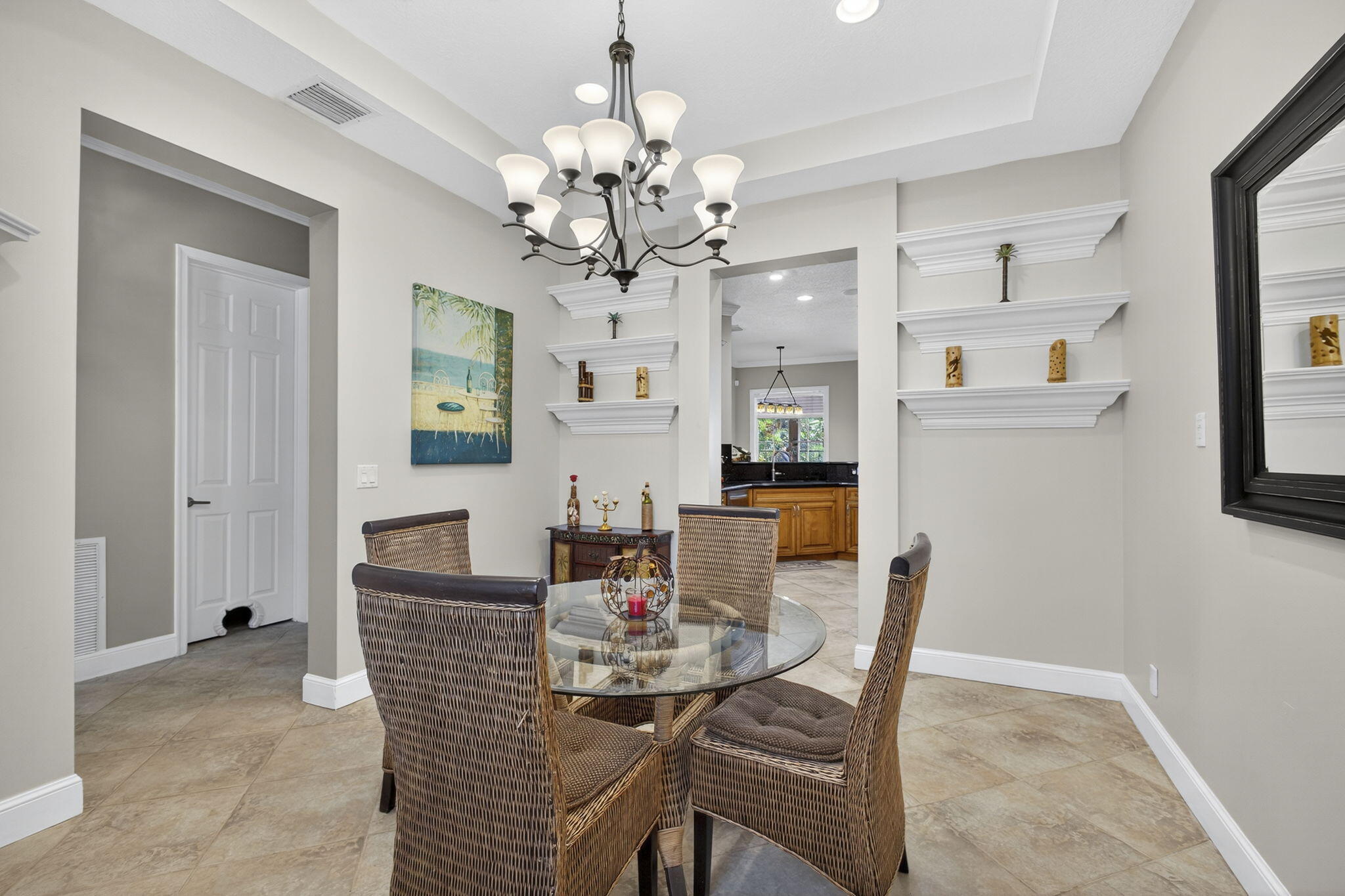 129 Via Bosque Jupiter, FL 33458 - Photo 26 of 92 a view of a dining room with furniture and chandelier