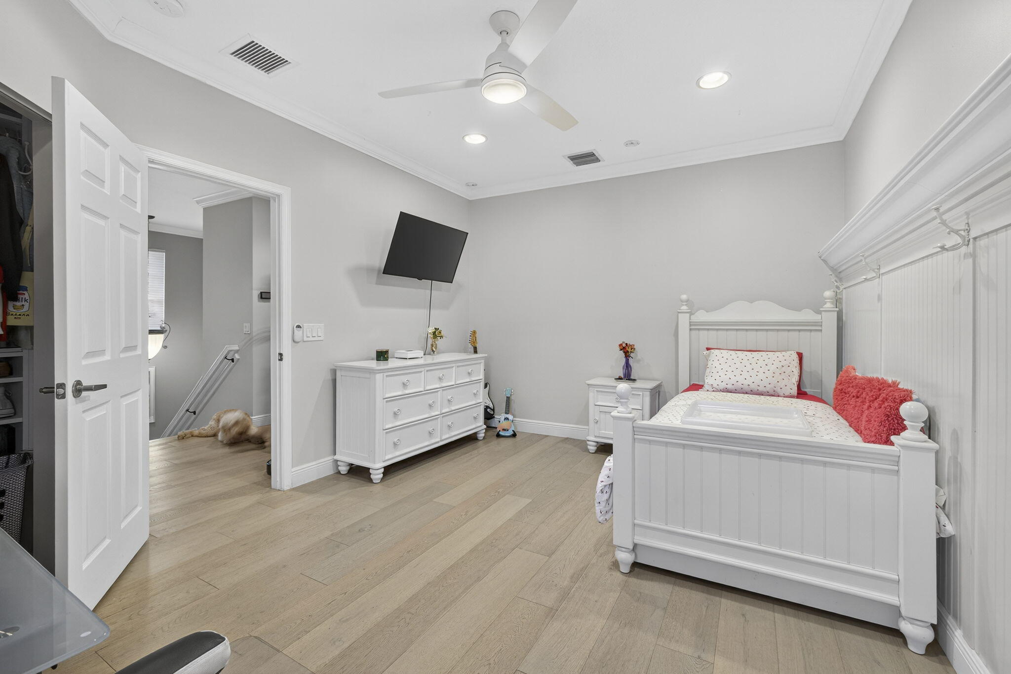 129 Via Bosque Jupiter, FL 33458 - Photo 48 of 92 a room with a bed and a flat tv screen