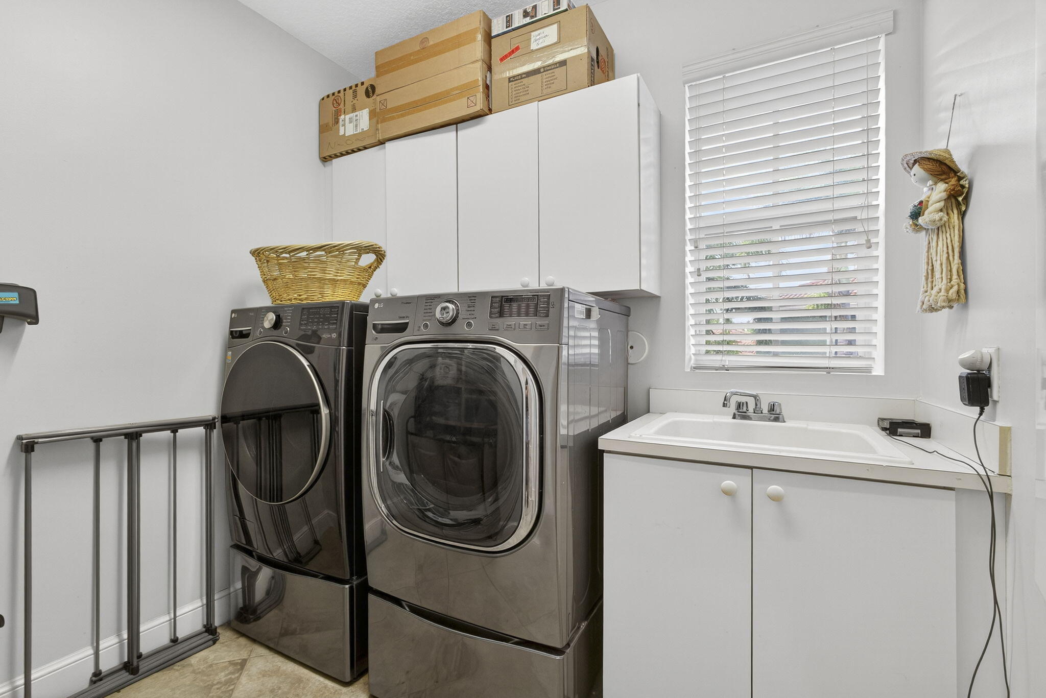129 Via Bosque Jupiter, FL 33458 - Photo 52 of 92 a utility room with dryer and washer