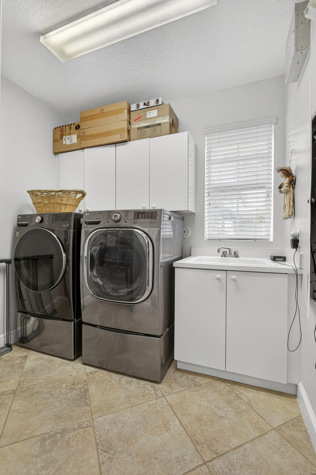 129 Via Bosque Jupiter, FL 33458 - Photo 53 of 92 a utility room with washer and dryer