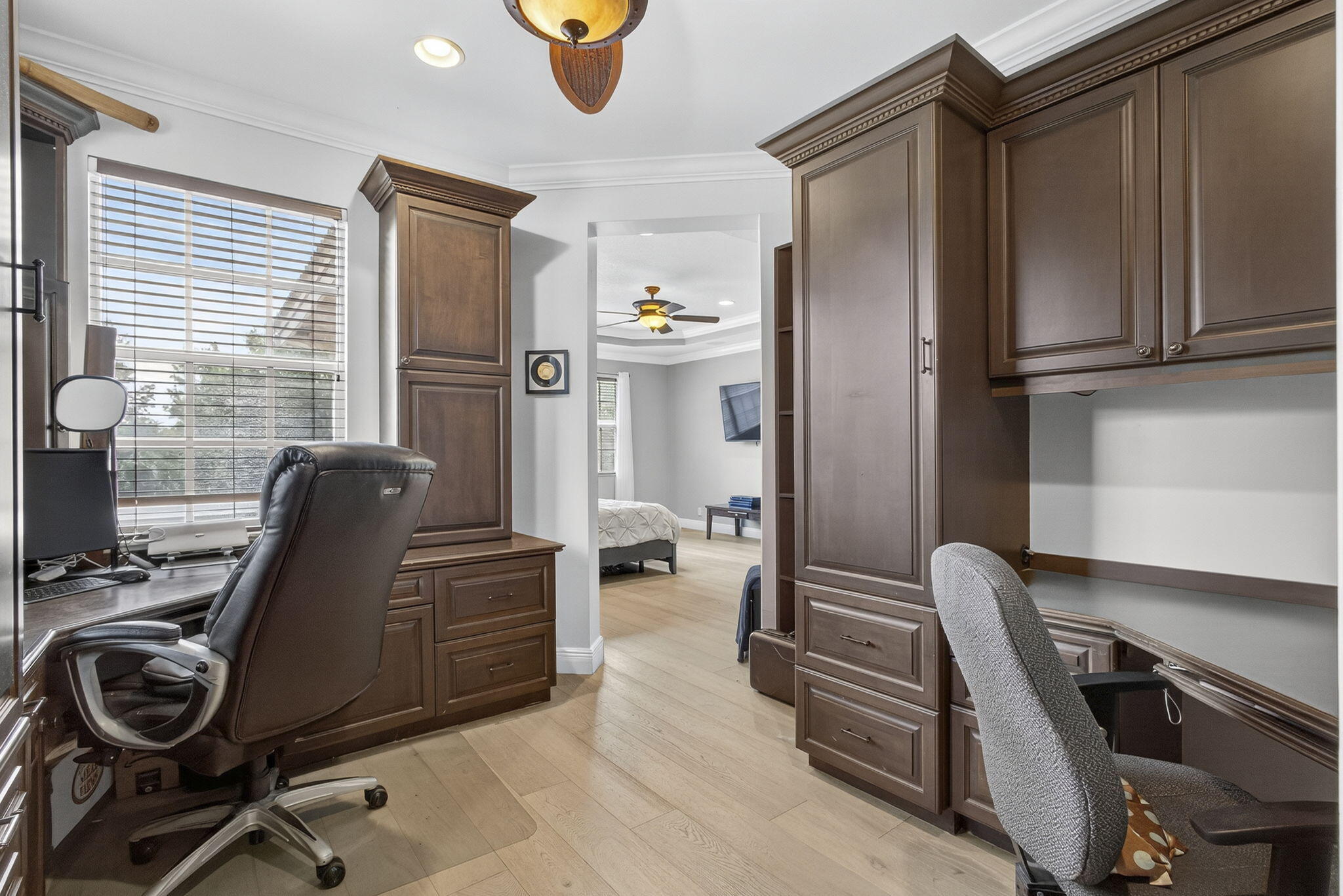 129 Via Bosque Jupiter, FL 33458 - Photo 58 of 92 a view of a workspace with furniture and a window