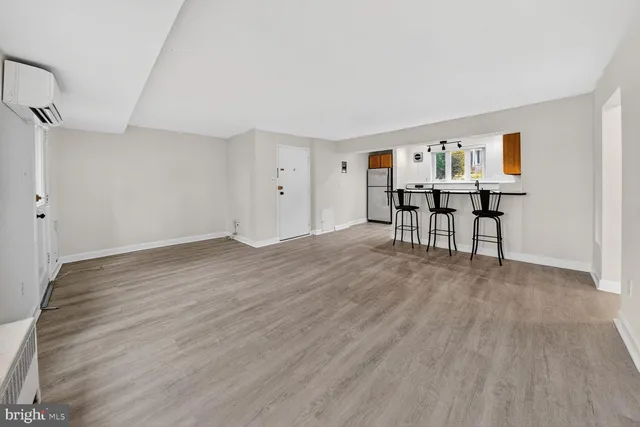 a view of livingroom with furniture and wooden floor