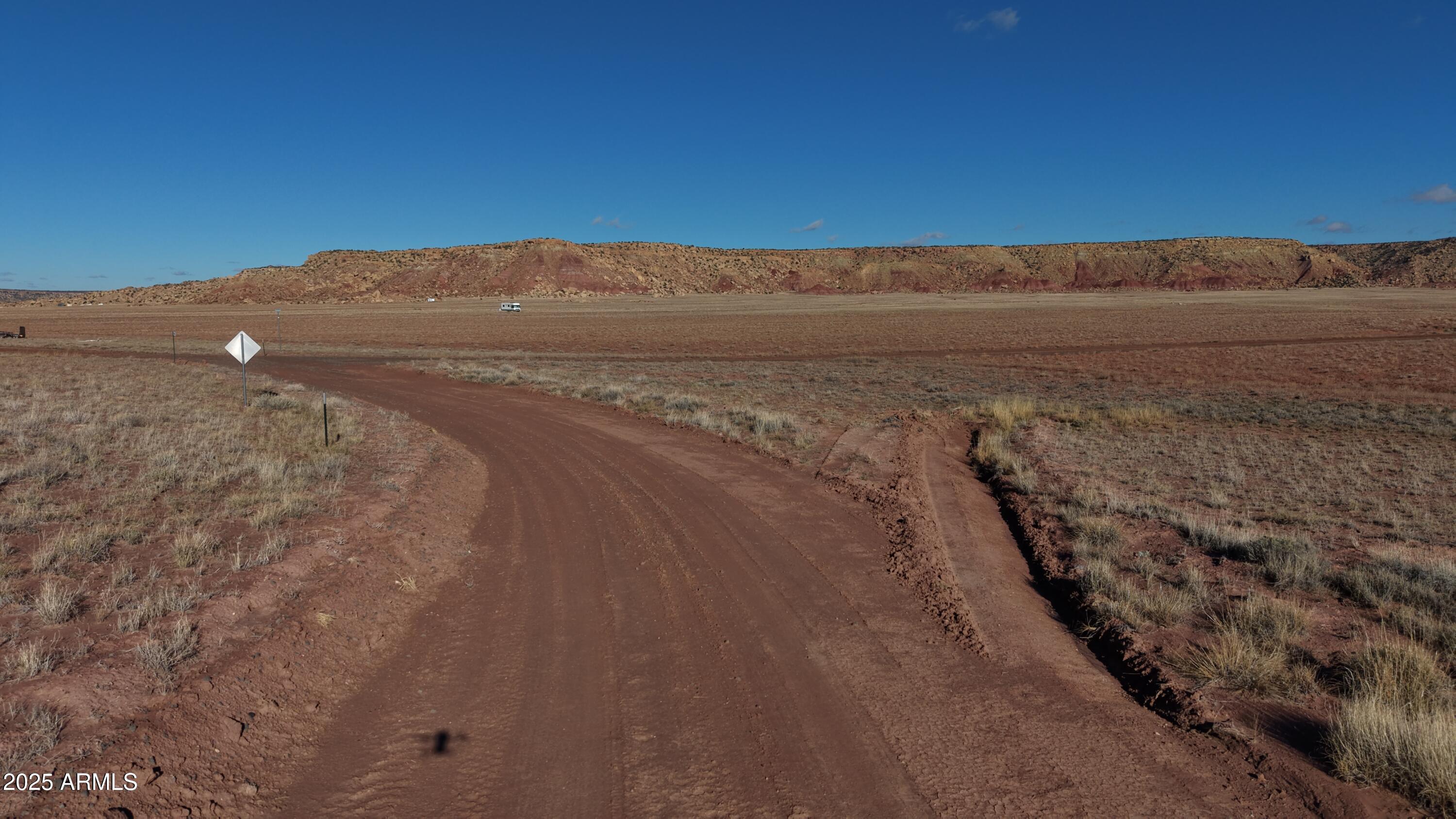 455 Sierra Highlands Road, Unit 455 St. Johns, AZ 85936 - Photo 13 of 15 a view of beach and mountain