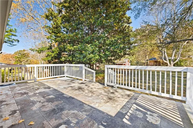 a balcony with a yard
