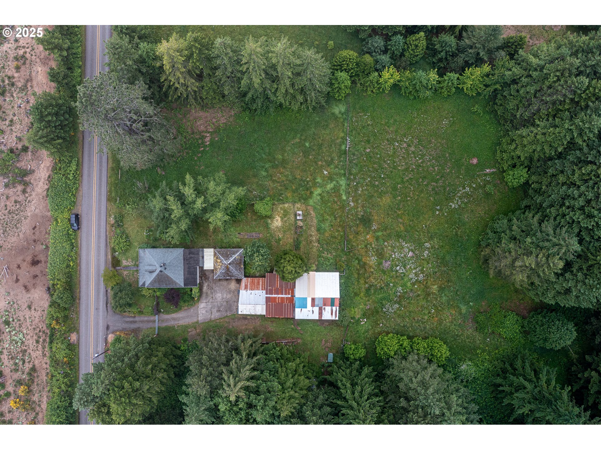 10303 Southeast Bull Run Road Sandy, OR 97055 - Photo 3 of 48 a view of a garden from a balcony
