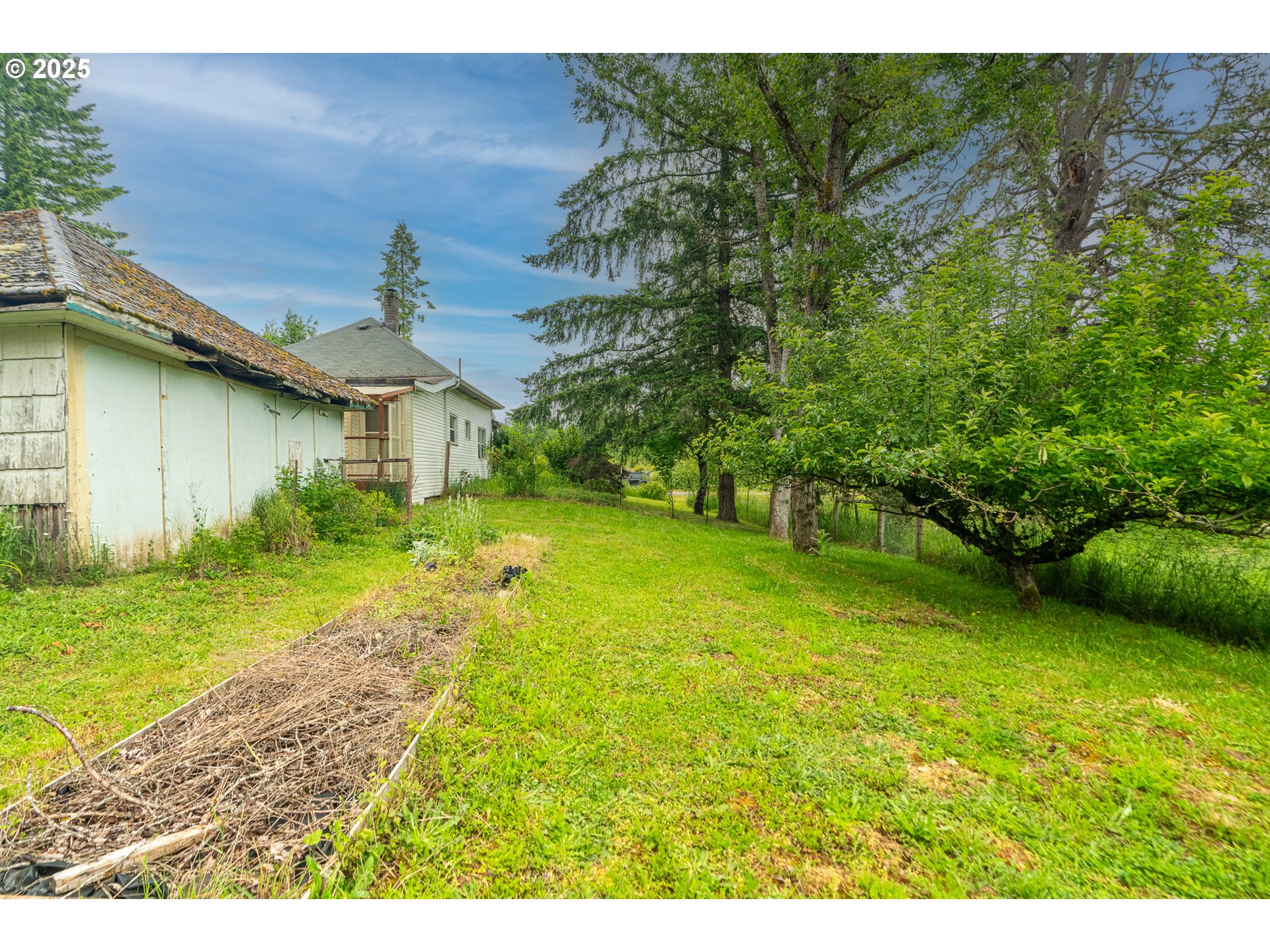 10303 Southeast Bull Run Road Sandy, OR 97055 - Photo 34 of 48 a view of a house with a yard