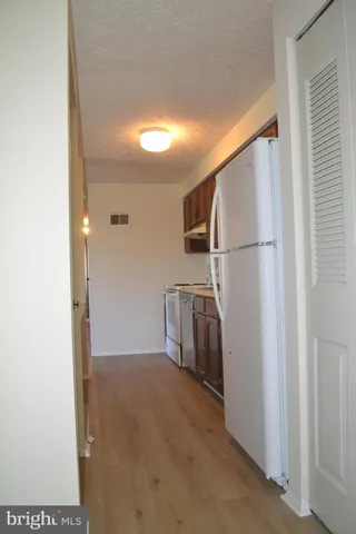 a view of a storage & utility room with washer and dryer