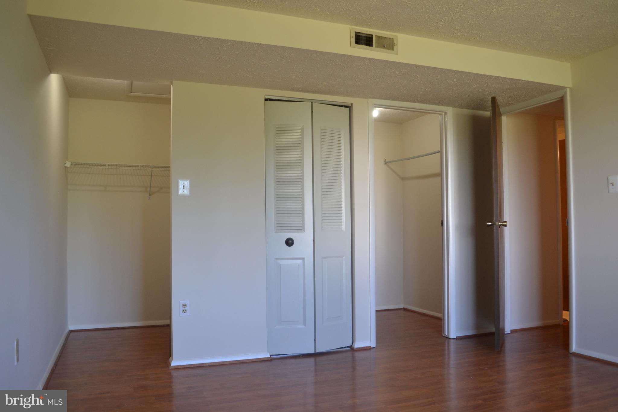 800 L Heather Ridge Drive, Unit 19L Frederick, MD 21702 - Photo 6 of 10 a view of entryway with wooden floor