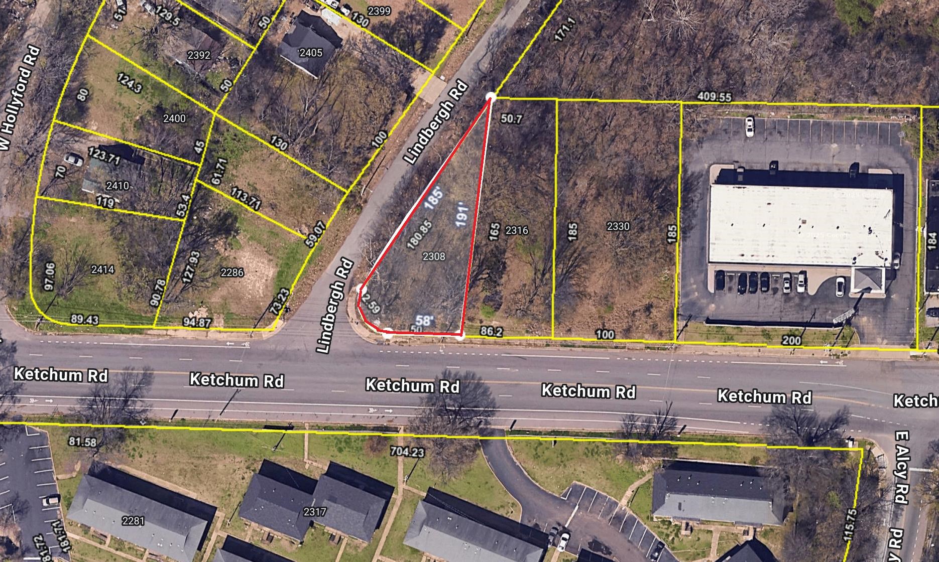 a view of an outdoor sitting area with a table and chair