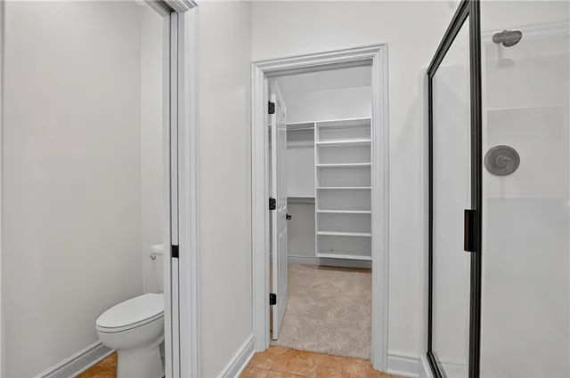 a view of bathroom with a toilet