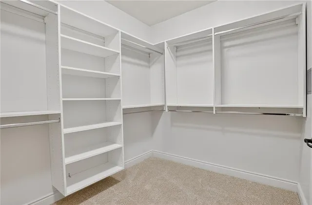 a view of an empty walk in closet