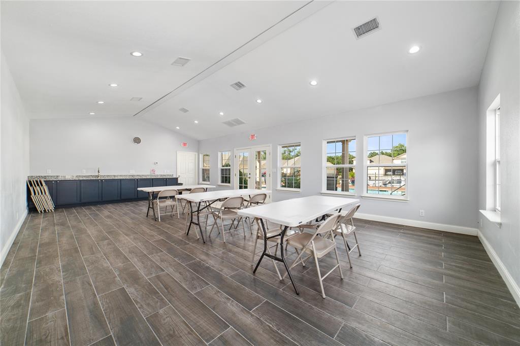 3002 Waterstone Way Brownwood, TX 76801 - Photo 29 of 35 a view of a dining room with furniture and wooden floor