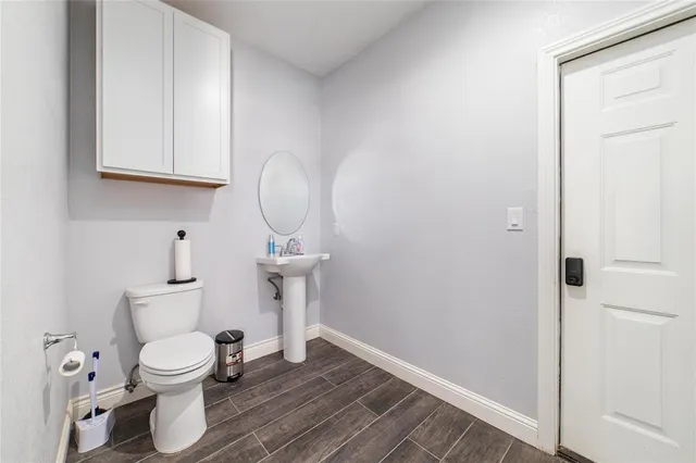 a view of a house with swimming pool and sitting area