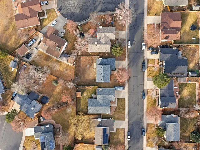 an aerial view of a city with lots of residential buildings