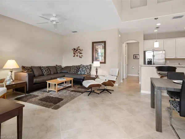 a view of kitchen with furniture and a potted plant