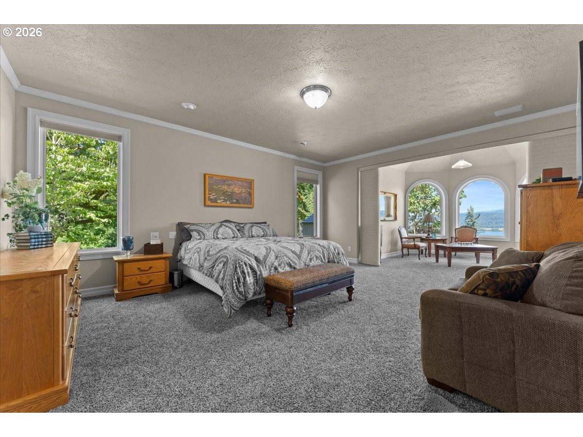 37123 Northeast Reed Road Corbett, OR 97019 - Photo 21 of 48 a living room with furniture and a large window