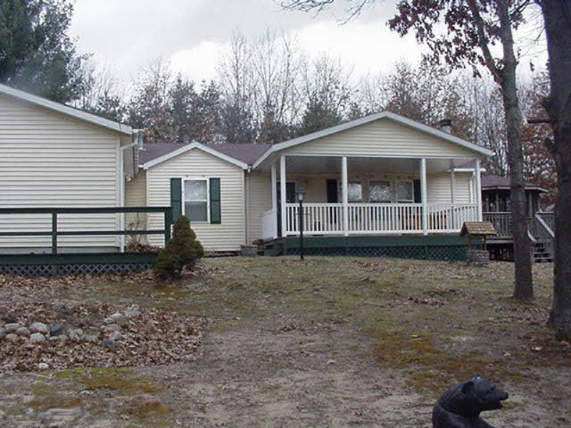 10554 West Colby Road Gowen, MI 49326 - Photo 1 of 1 GetAttachment
