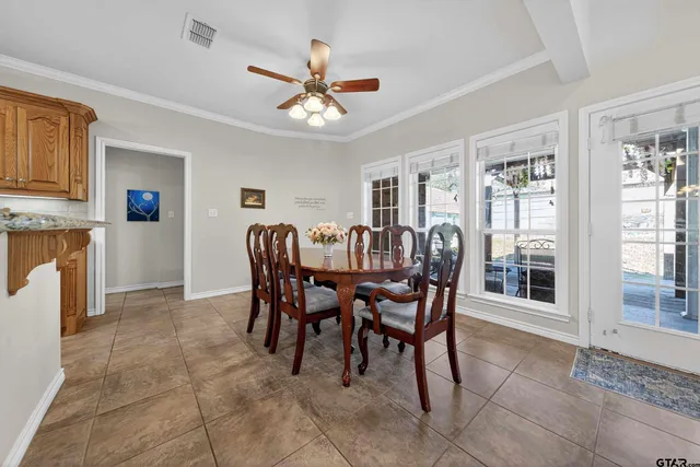 a view of a dining room with furniture
