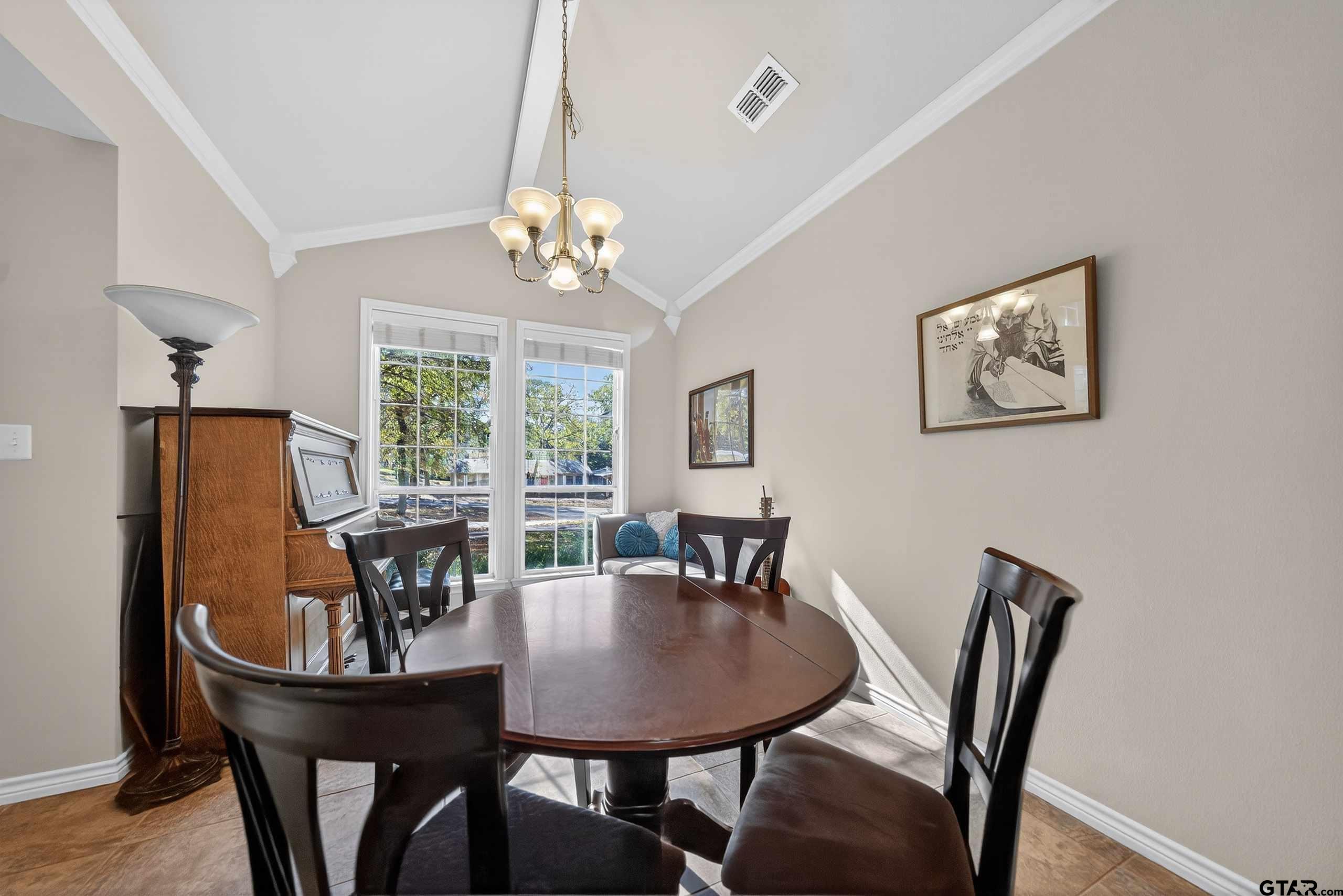332 Highlander Heights Hideaway, TX 75771 - Photo 34 of 39 a view of a dining room with furniture window and wooden floor