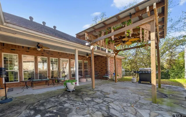 a view of a building with sitting area
