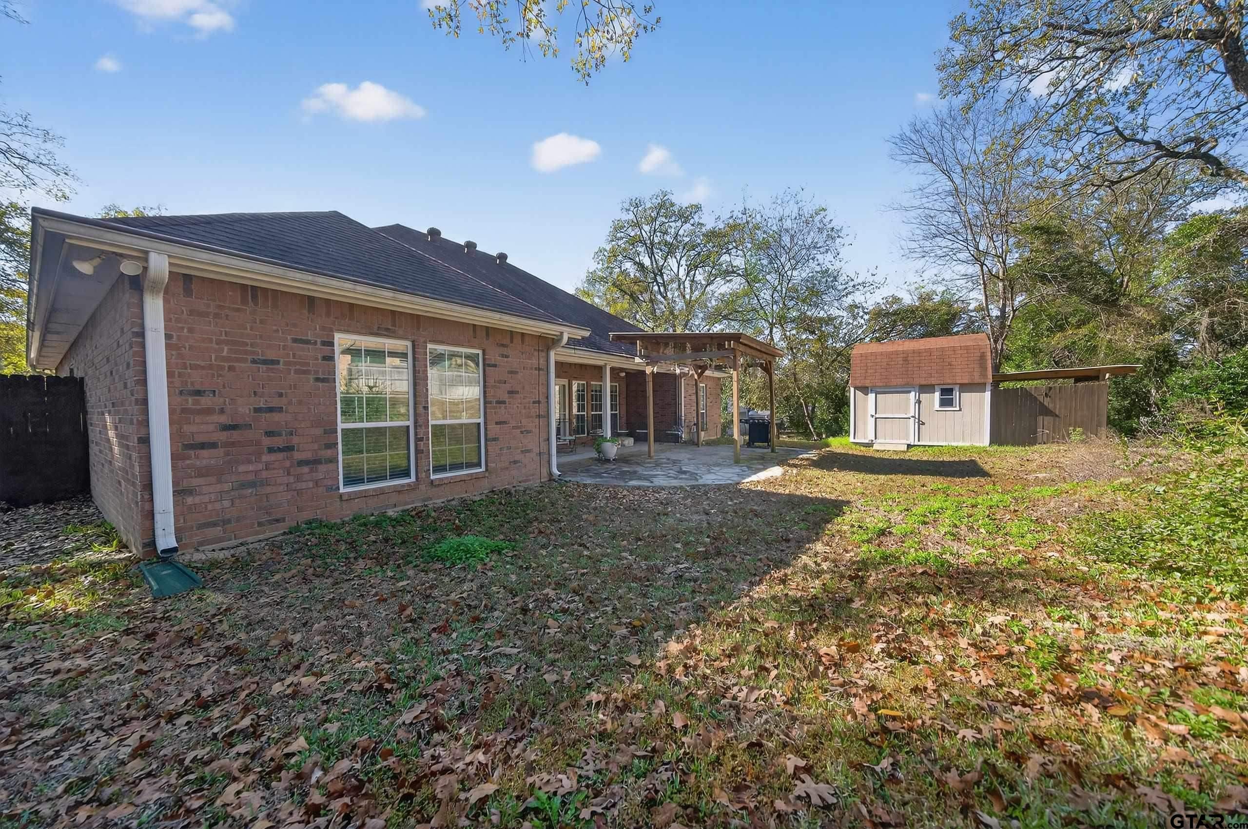 332 Highlander Heights Hideaway, TX 75771 - Photo 9 of 39 a view of a house with a yard and garage