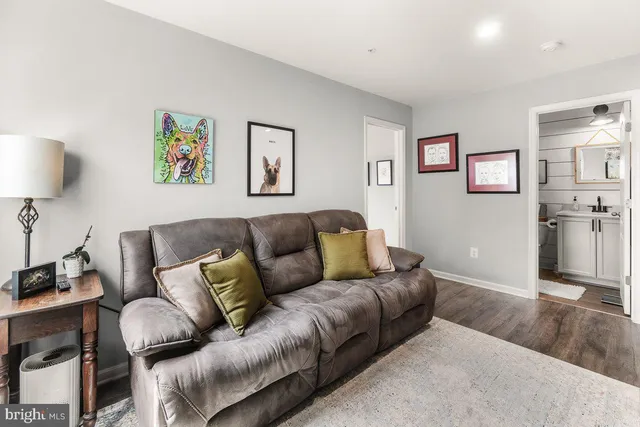 a living room with furniture and a couch