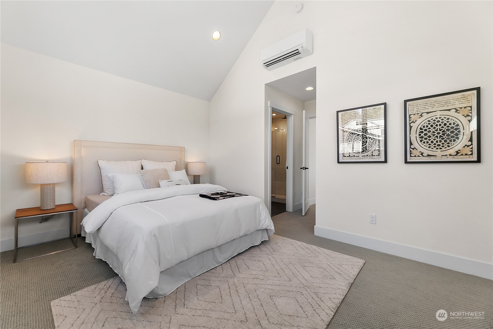 3617 South Hanford Street Seattle, WA 98144 - Photo 11 of 32 a bedroom with a large bed and a lamp