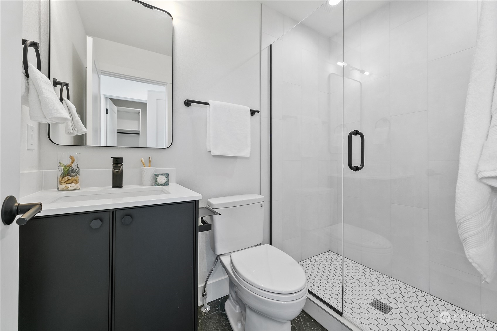 3617 South Hanford Street Seattle, WA 98144 - Photo 12 of 32 a bathroom with a sink toilet and shower