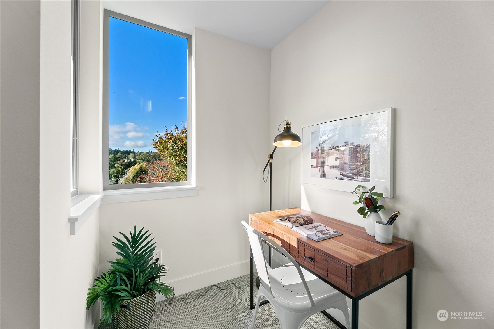 3617 South Hanford Street Seattle, WA 98144 - Photo 19 of 32 a view of a dining room with furniture and a potted plant