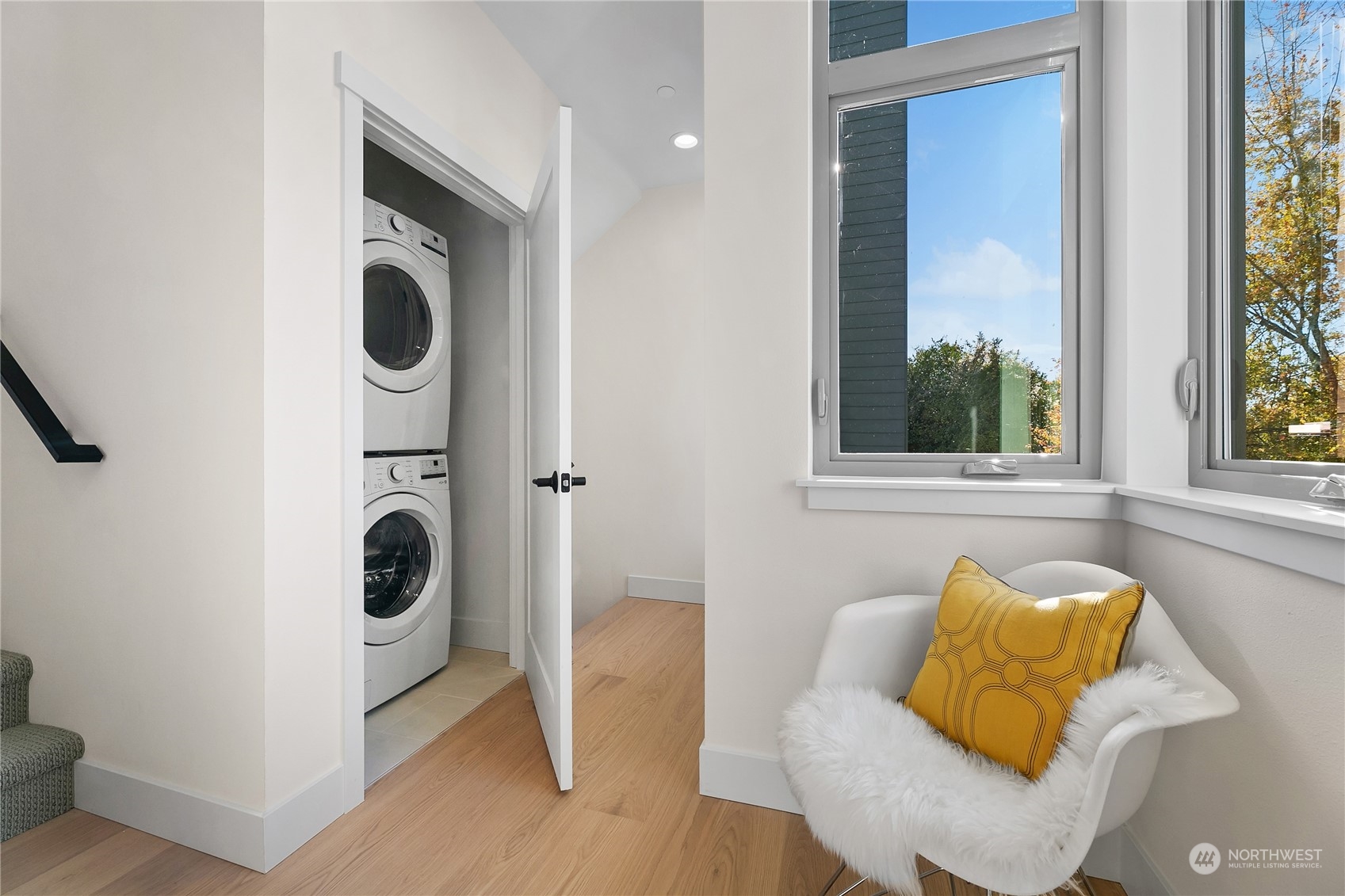 3617 South Hanford Street Seattle, WA 98144 - Photo 22 of 32 a living room with a couch and a window with outer view