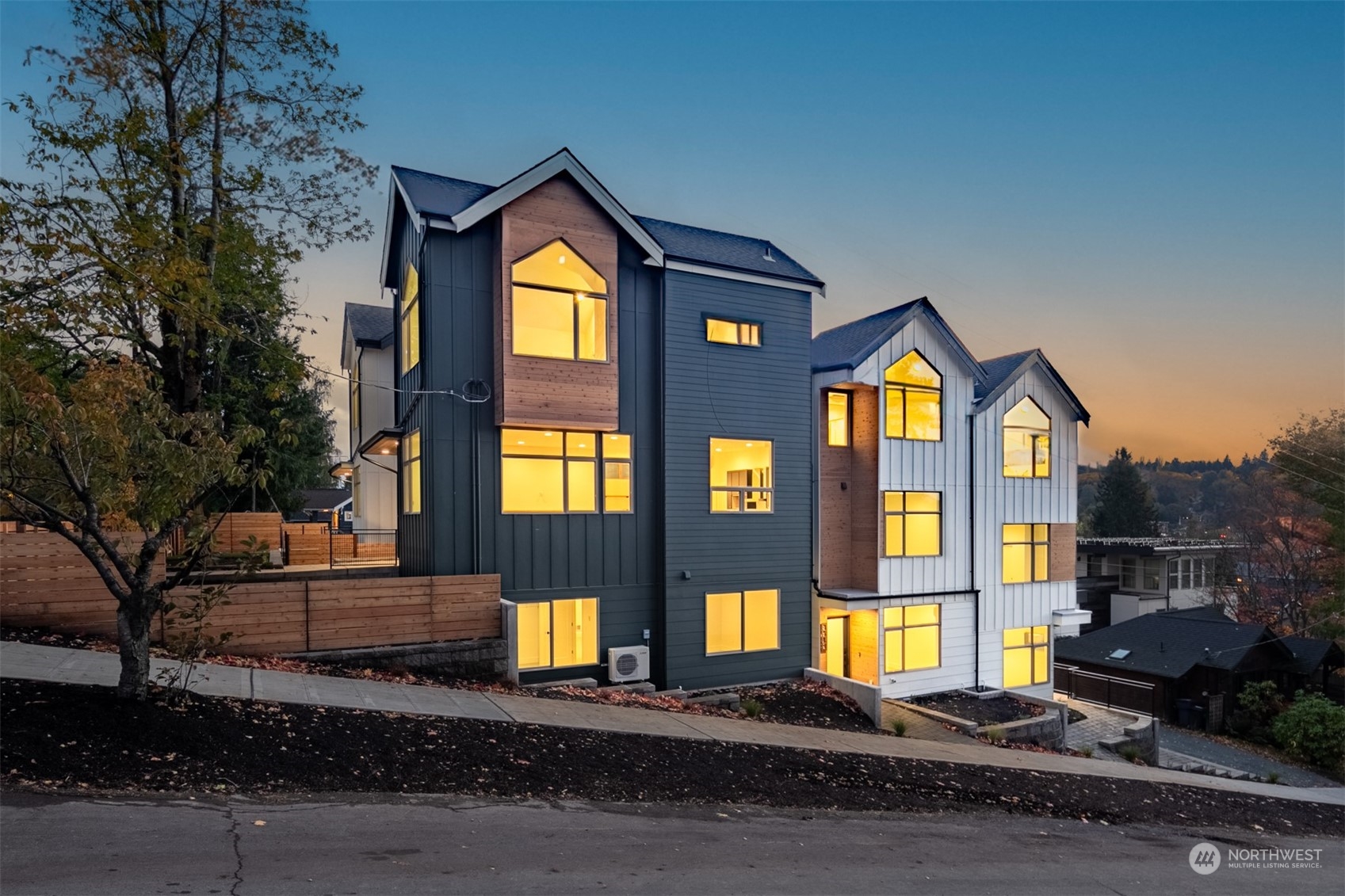 3617 South Hanford Street Seattle, WA 98144 - Photo 30 of 32 a front view of a house with a yard