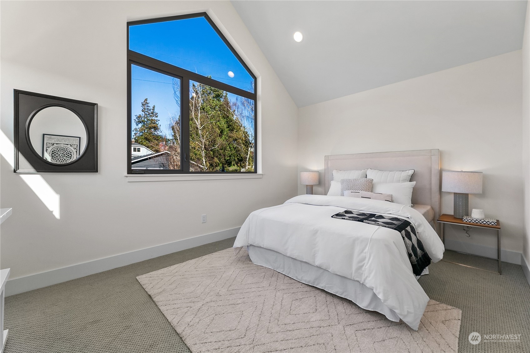 3617 South Hanford Street Seattle, WA 98144 - Photo 9 of 32 a bedroom with a bed and a window