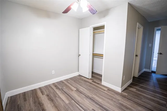 a kitchen with a sink cabinets and window