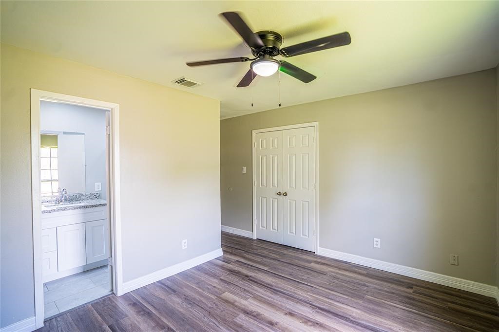 7130 Heath Street Houston, TX 77016 - Photo 10 of 18 a view of empty room with wooden floor