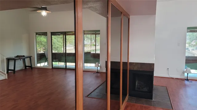 a view of livingroom with furniture and floor to ceiling window