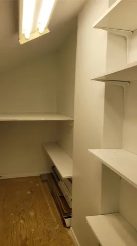 a view of small space with racks on the wall