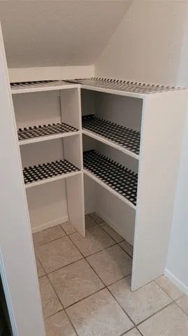 a room with furniture and a window