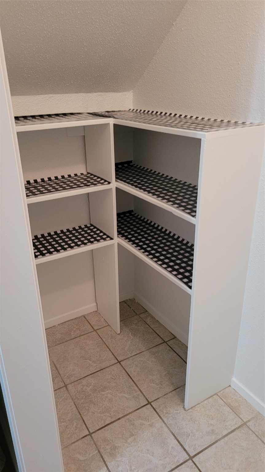 14777 Wunderlich Drive, Unit 112 Houston, TX 77069 - Photo 17 of 23 a close view of a stove a microwave and a sink