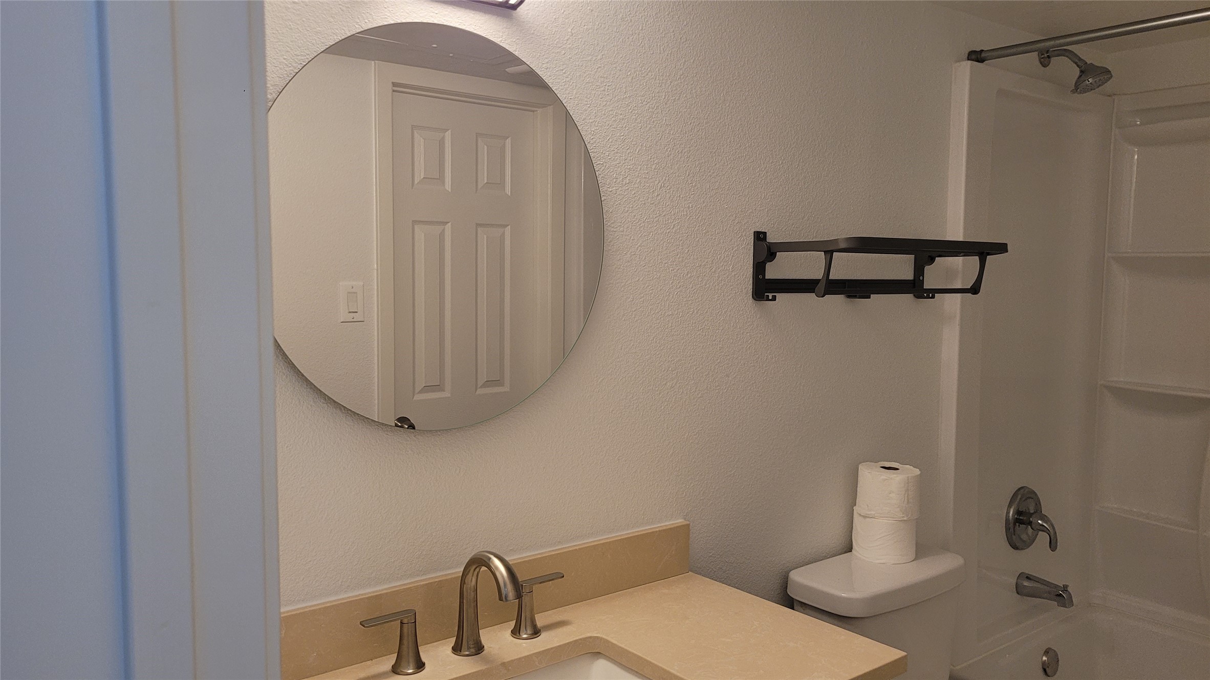 14777 Wunderlich Drive, Unit 112 Houston, TX 77069 - Photo 2 of 23 a bathroom with a sink toilet and shower