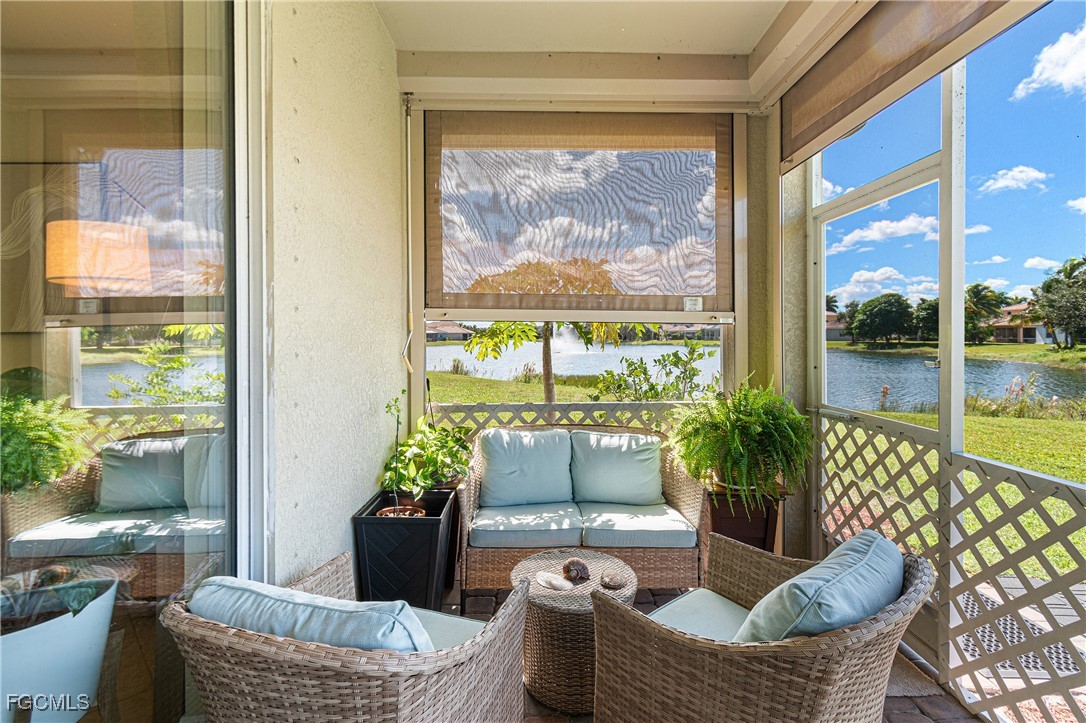 11656 Eros Road Lehigh Acres, FL 33971 - Photo 2 of 49 a living room with furniture and a potted plant
