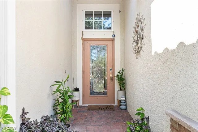 view of a entryway with flower plants