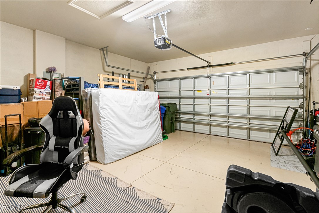 11656 Eros Road Lehigh Acres, FL 33971 - Photo 38 of 49 a utility room with dryer and washer
