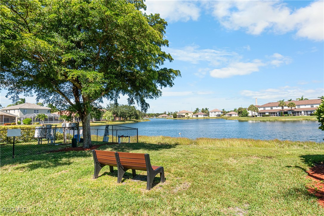 11656 Eros Road Lehigh Acres, FL 33971 - Photo 49 of 49 a swimming pool with outdoor seating and yard