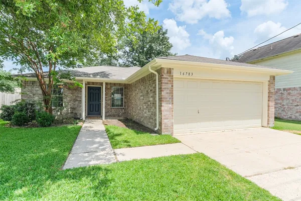 a front view of house with yard