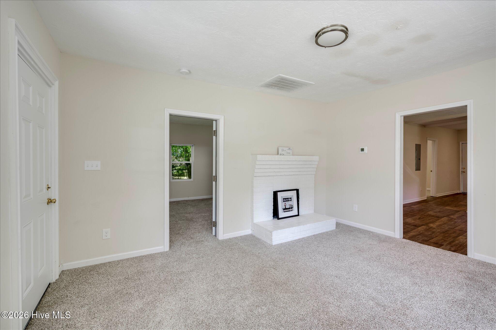 124 West Street Thomson, GA 30824 - Photo 6 of 28 Living Room Fireplace